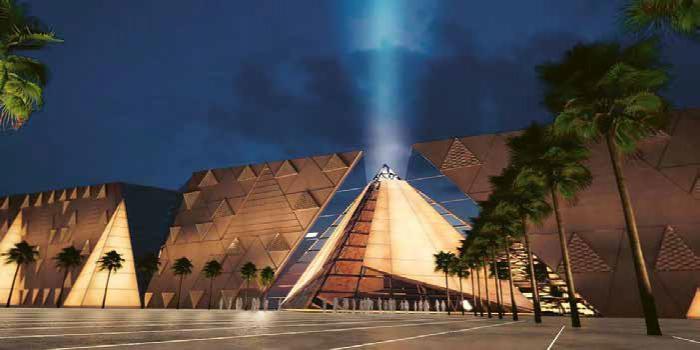 A Gízai-fennsíkon Kairó és a piramisok között elhelyezett Nagy Egyiptomi Múzeum (Grand Egyptian Museum – GEM) a piramisokat részletformáiban is megidéző gigantikus épülete a dublini Heneghan-Peng építésziroda látványtervein. A A világ legnagyobb múzeuma 2018 tavaszára készül el © Heneghan-Peng Architects